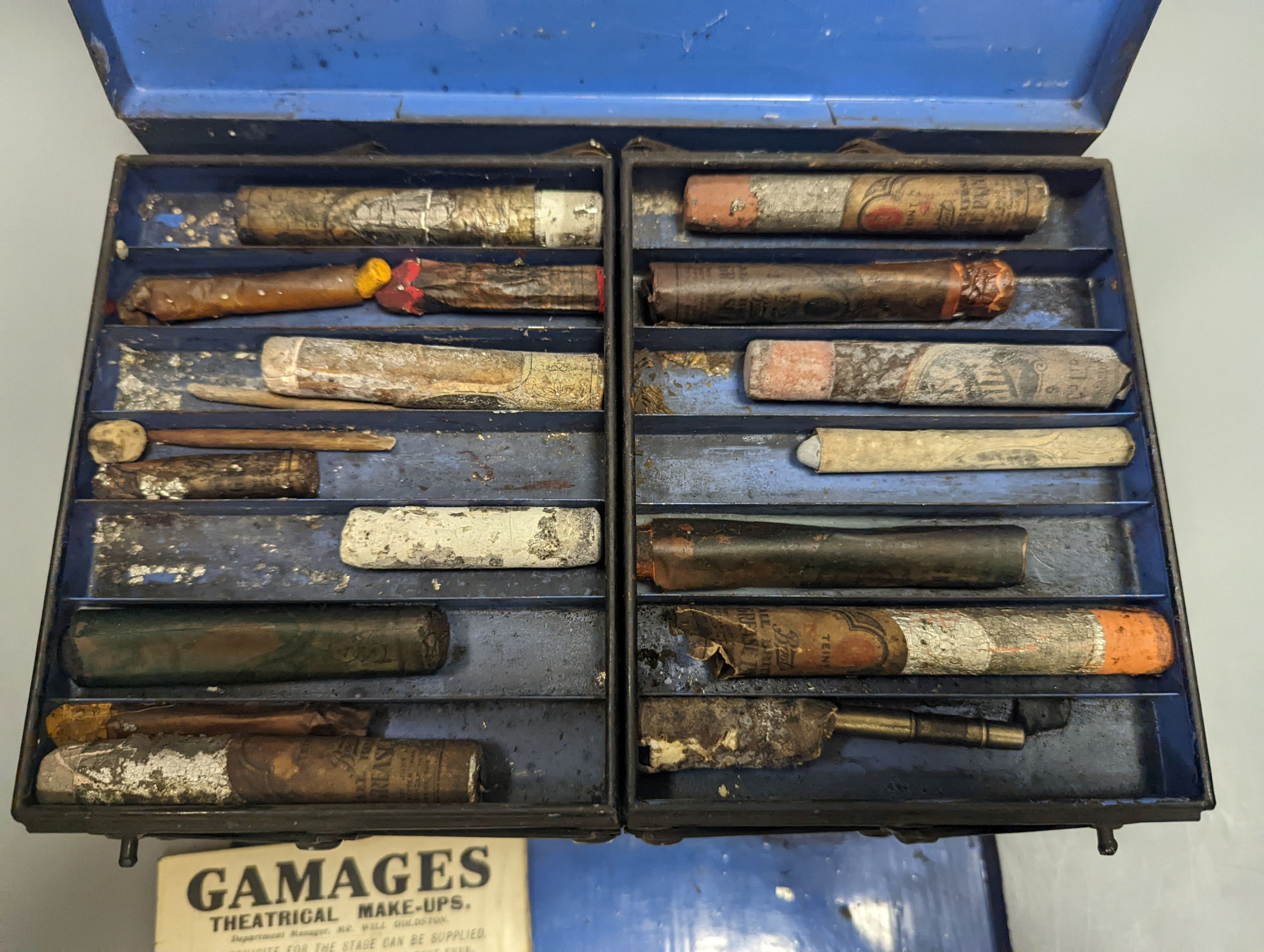 A vintage theatrical make up set, tin cased